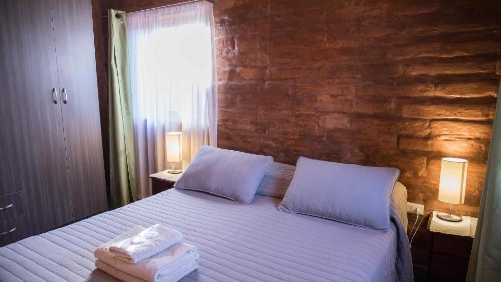 Отель Hostal Solor Сан-Педро-де-Атакама Экстерьер фото